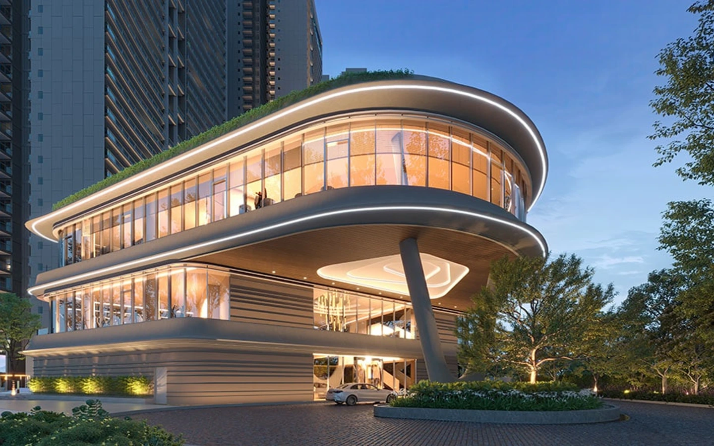 experion the trillion modern clubhouse front and night view